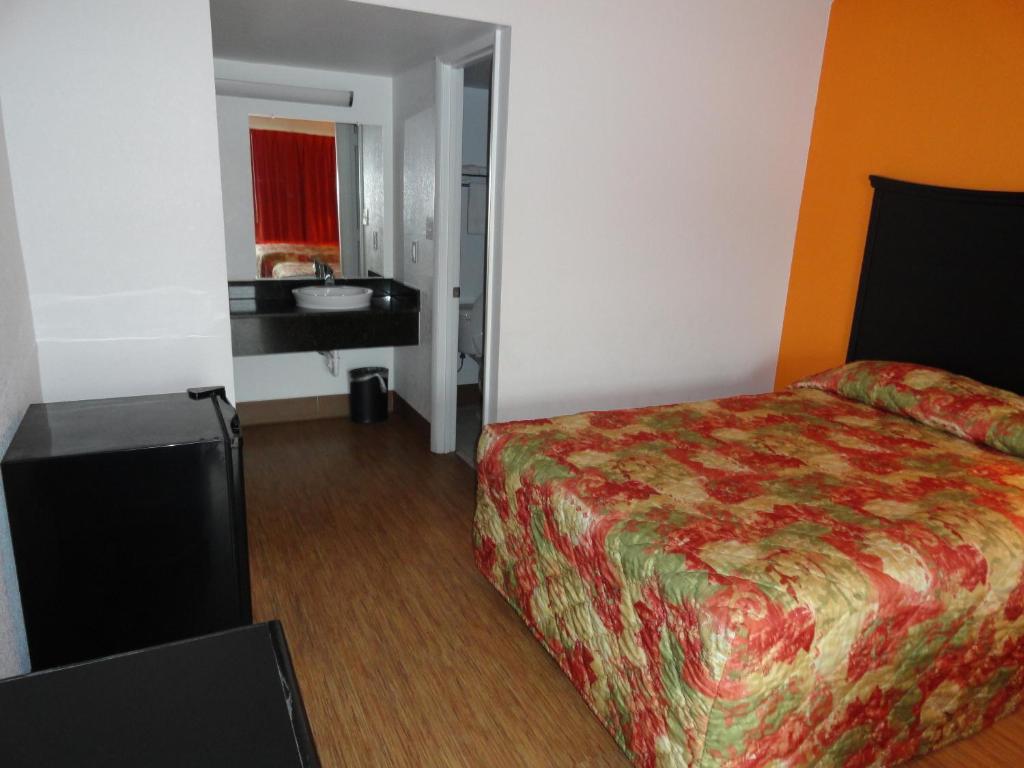 Econo Lodge Метрополис Стая снимка